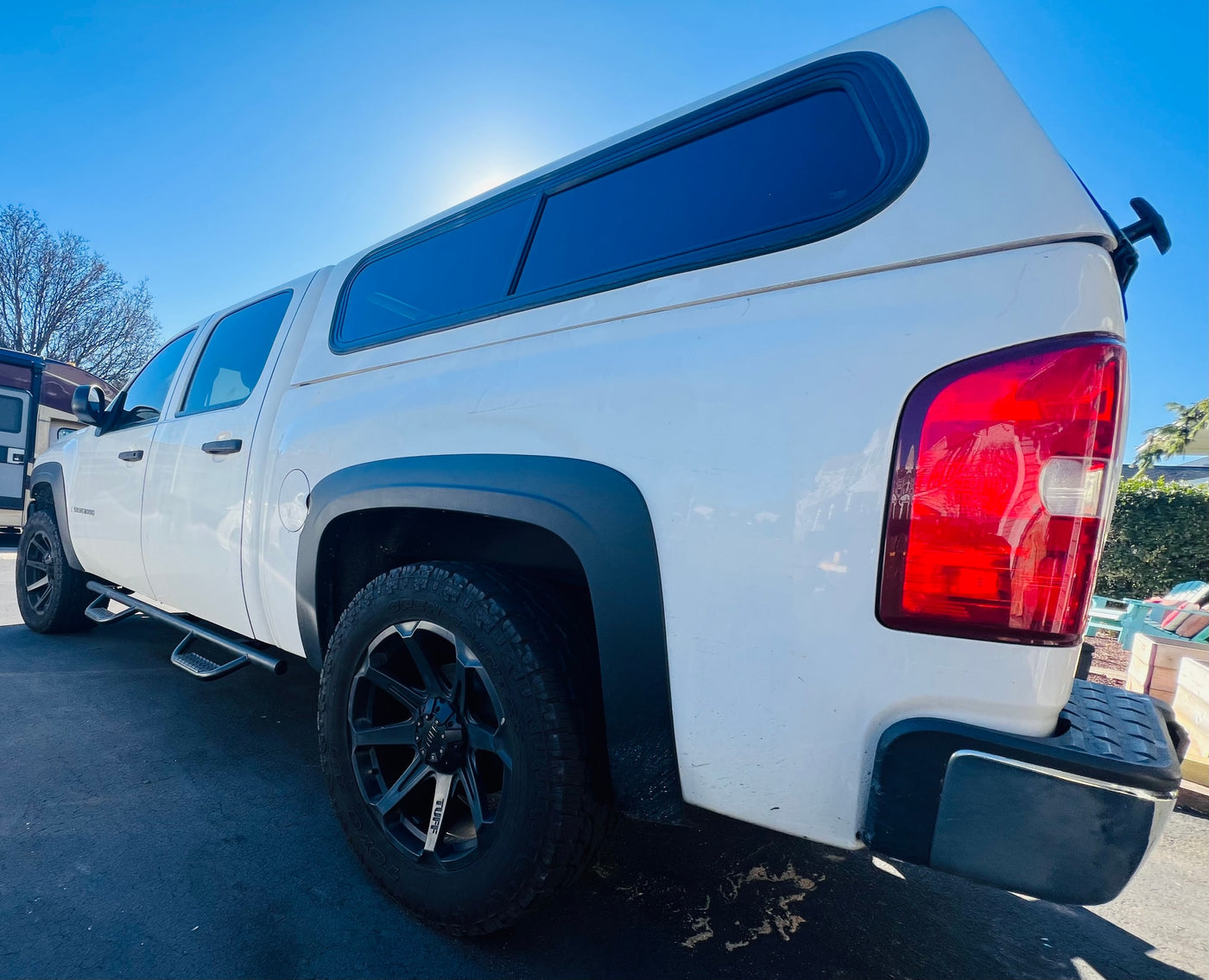  and built-in storage. Ideal for RV rental road trips.|White pickup truck with topper — photo 23