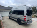  and packed camping gear in a camper van