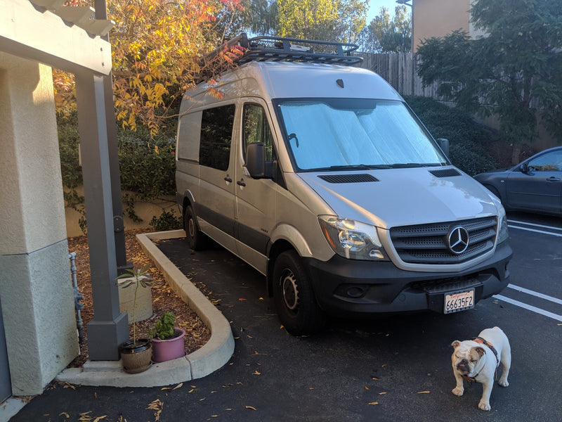 Silver Mercedes Sprinter van RV rental, parked with a bulldog. Ideal for pet-friendly travel adventures. — photo 28