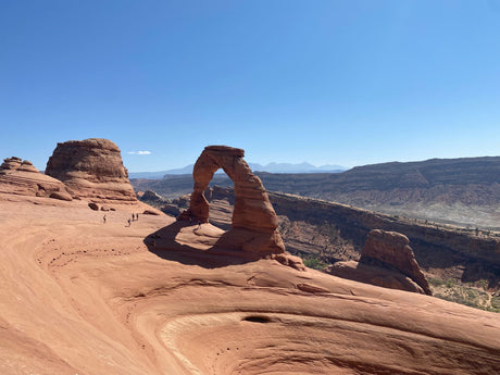 Iconic Delicate Arch, red rock landscape, Arches NP, Utah. Explore by RV rental for an unforgettable adventure.