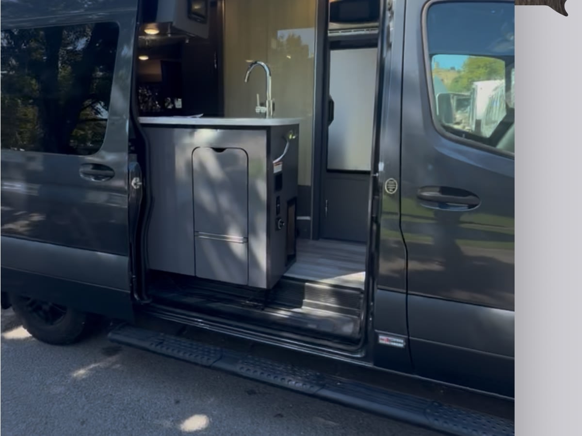  and toilet paper holder.|Adventure awaits with this luxury rv rental van — photo 13