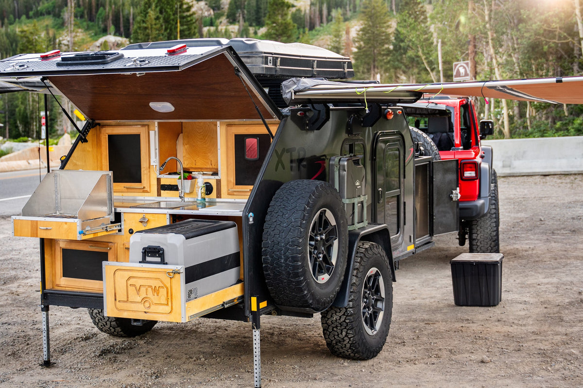 This fully equipped XTR off-road camper trailer with a pull-out kitchen is ideal for your next RV rental adventure. — photo 9