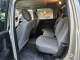 Interior of a large vehicle for RV rental. Shows spacious rear seating and clean passenger cabin ready for travel.