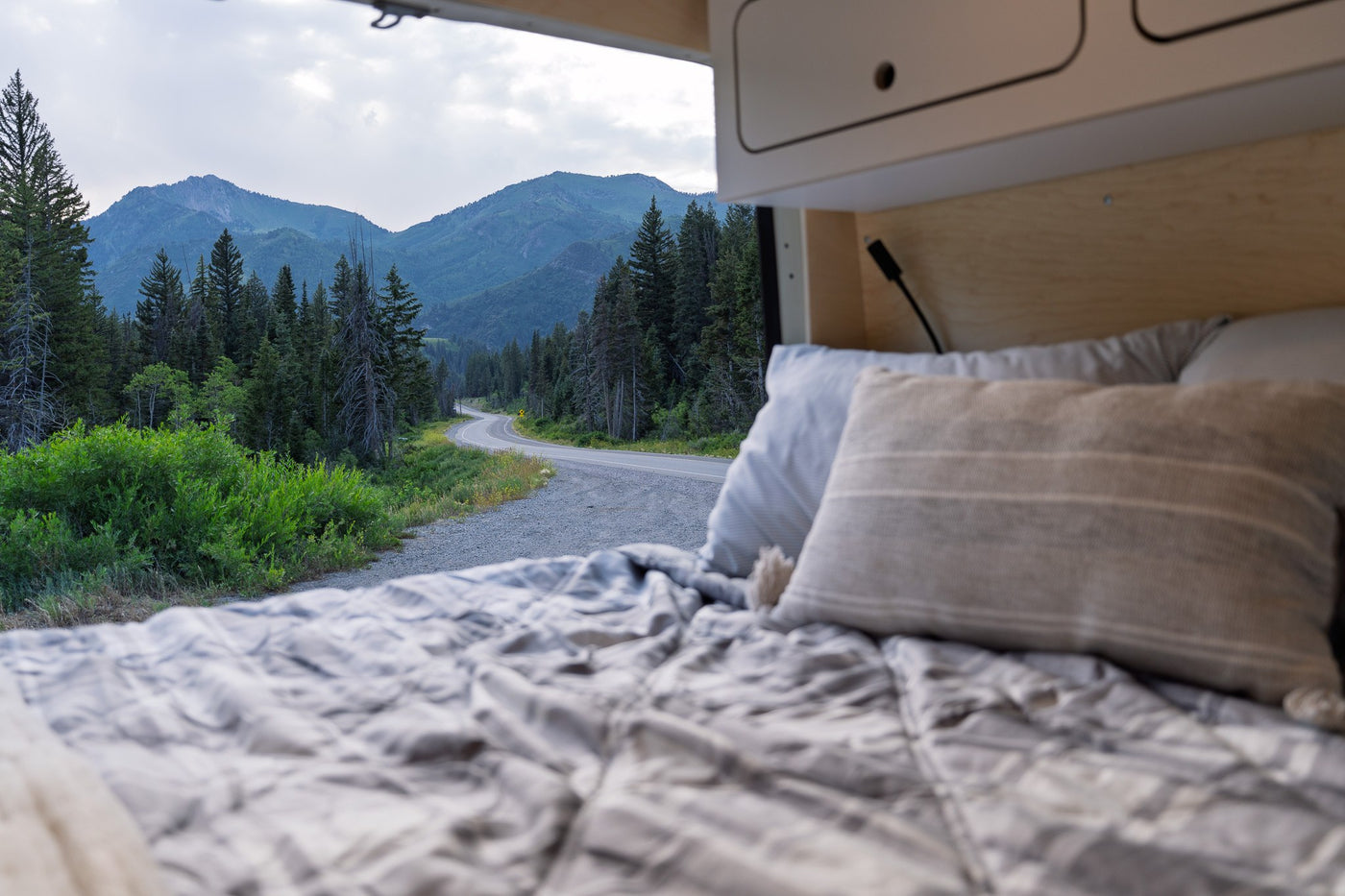  and ample storage.|Modern RV rental kitchen inside a camper van — photo 3