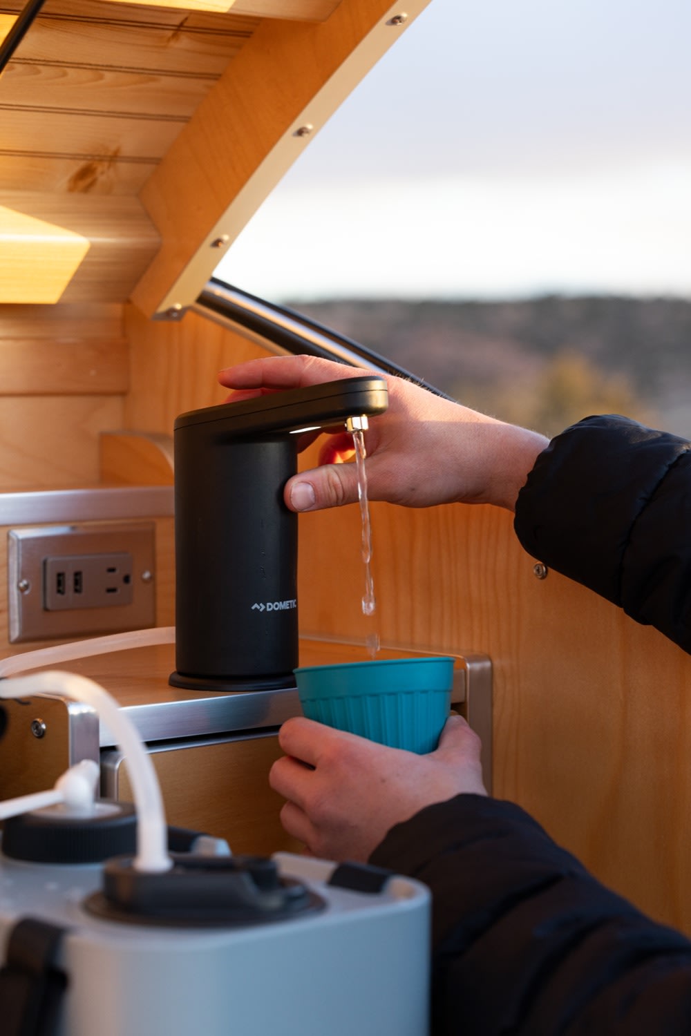  ready for adventure.|Explore with an **rv rental**! This High Camp teardrop trailer reveals its Dometic outdoor kitchen — photo 6