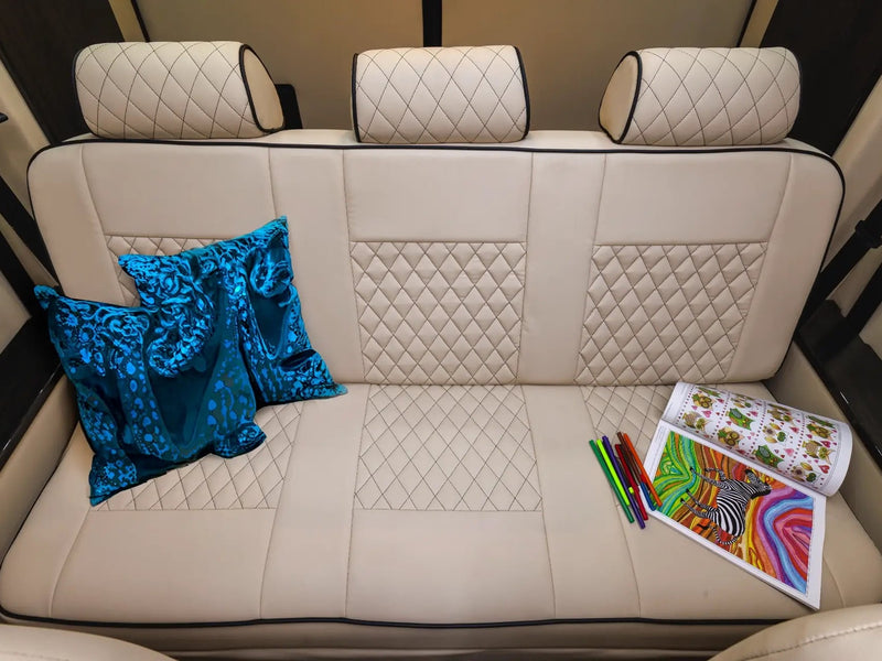  featuring premium seating and personal amenities for high-end road trips.|Dometic built-in drawer fridge — photo 14