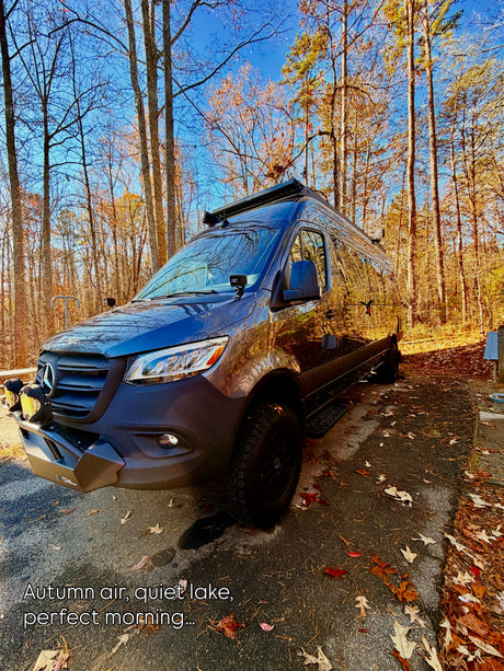 This custom Mercedes Sprinter campervan RV rental is perfect for autumn adventures among fall foliage.