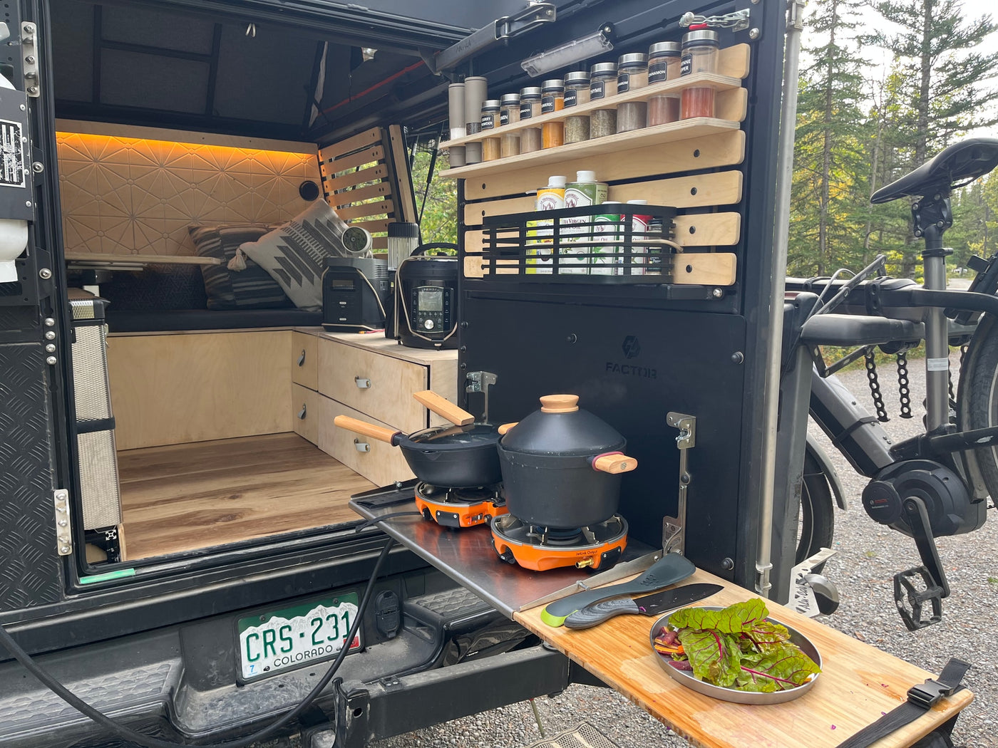 RV rental adventure! Cozy sleeping area and well-equipped mobile kitchen for camp cooking & outdoor living, complete with bike. — photo 14