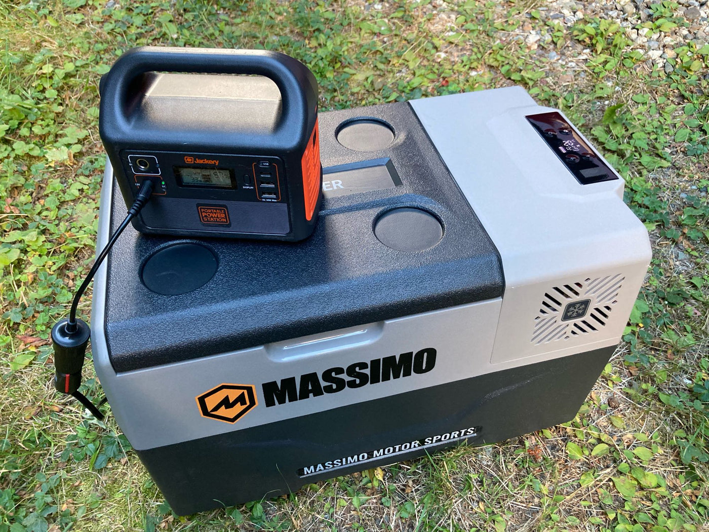 Jackery portable power station connected to a Massimo portable cooler, ideal gear for your RV rental or camping. — photo 6