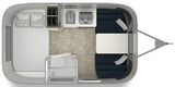 Overhead view of a modern RV rental's interior floor plan, detailing bedroom, kitchen, dining, and bathroom layout.