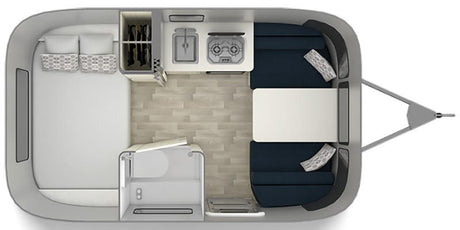 Overhead view of a modern RV rental's interior floor plan, detailing bedroom, kitchen, dining, and bathroom layout.