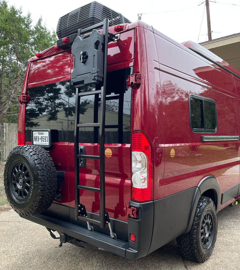  is ideal for an RV rental adventure on the open road.|Stunning red pop-top camper van with rugged off-road tires — photo 11