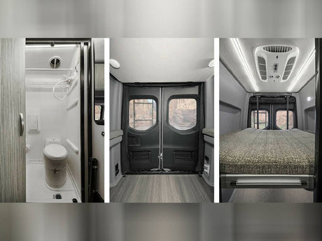 An RV rental interior showing a small shower/toilet, rear doors with windows, and a raised bed.