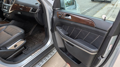 Explore the spacious interior of this Mercedes-Benz, from dashboard to leather seat. An excellent choice, even if you considered an RV rental.