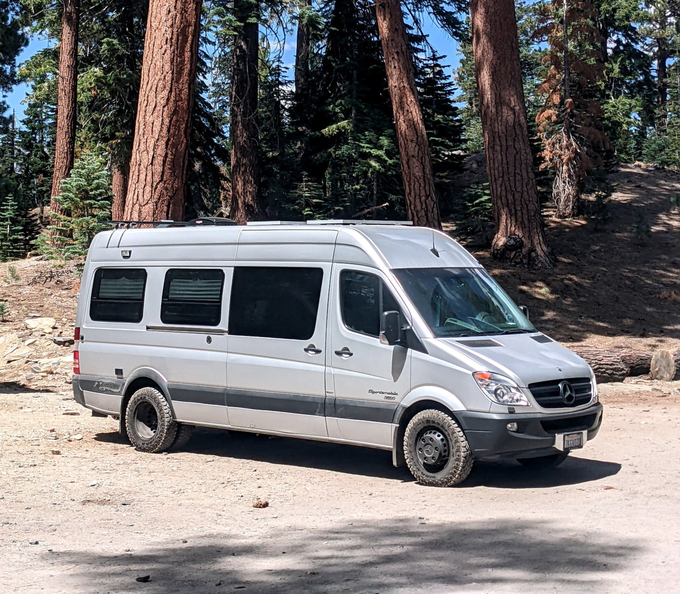  ready for off-grid adventures.|A silver Mercedes-Benz Sprinter van — photo 2