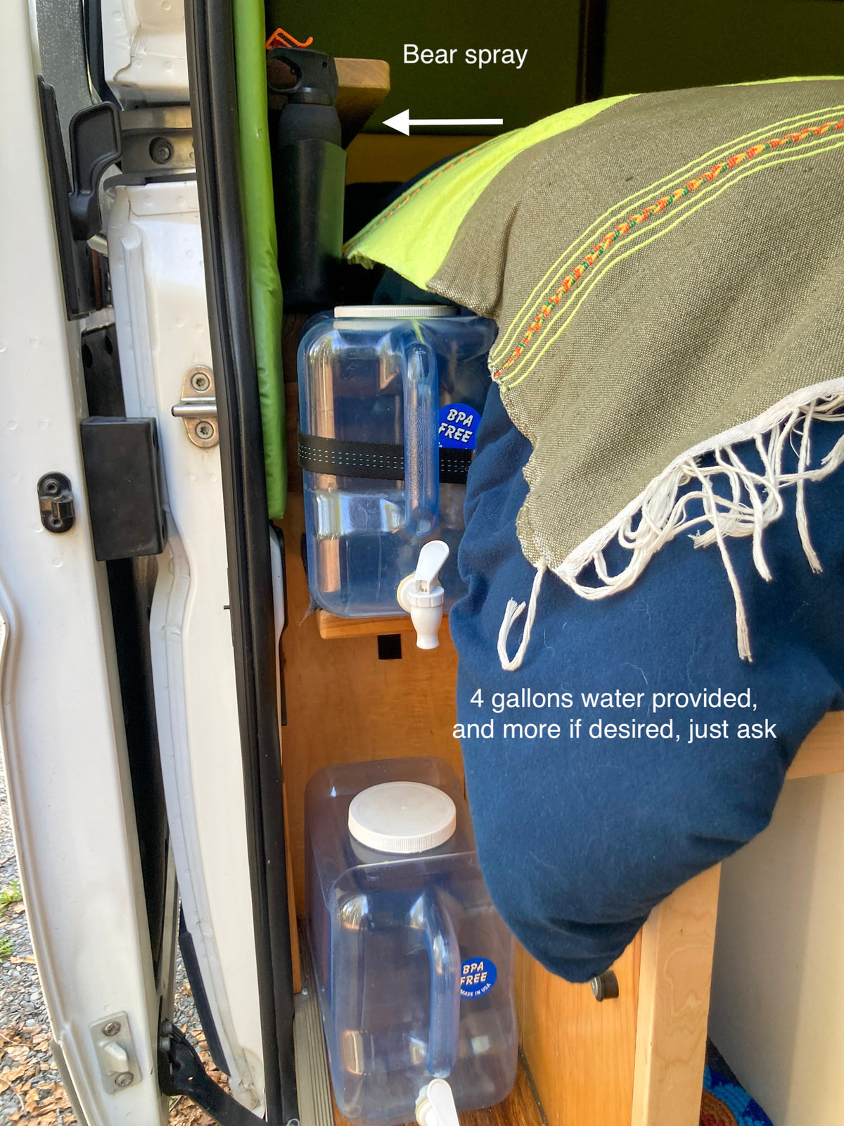 RV rental amenities: bear spray & 4 gallons BPA-free water. Essential for camping and van life adventures. — photo 19
