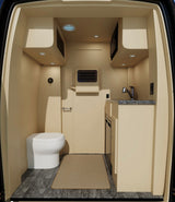 Compact RV rental interior with toilet, kitchenette (sink, microwave), and wood-look flooring. Perfect for travel.