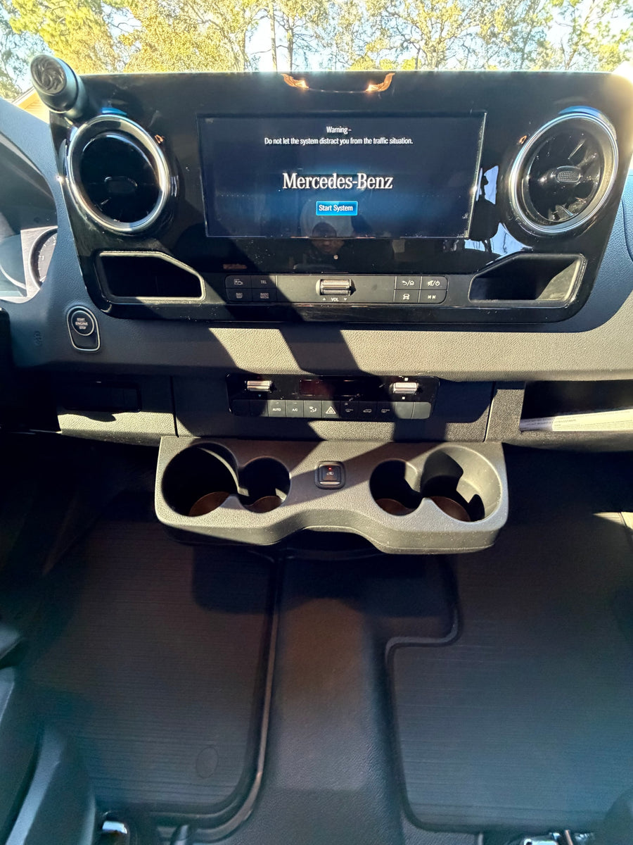  and rear storage for adventure.|Front view of a silver Mercedes-Benz Sprinter van