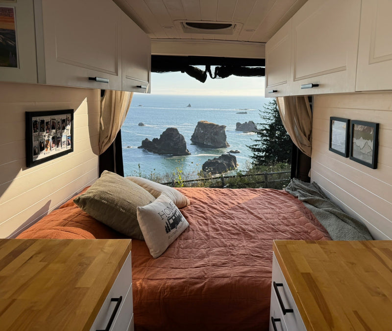  and an ocean view at a beach with a surfer.|An RV rental — photo 5