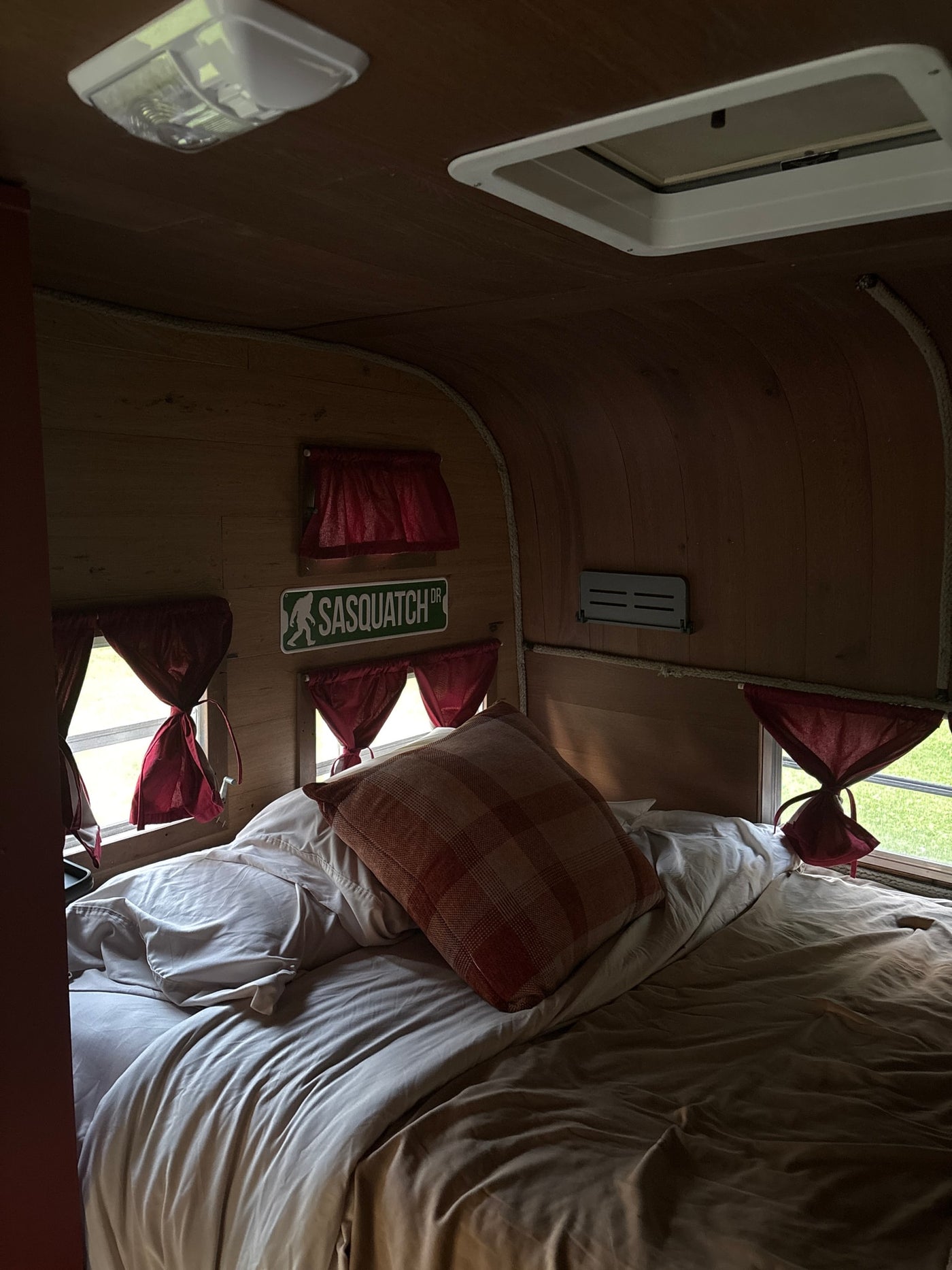  and a portable VISA POTTY 248 for convenience.|RV rental interior: an open wooden closet with shelves — photo 17