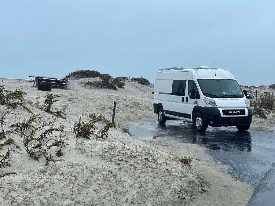  and side window street view.|Modern RV rental interior with shiplap walls