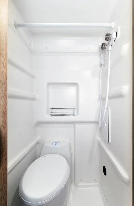  and seating for efficient travel.|Front view of a white Winnebago Ram ProMaster RV rental — photo 7