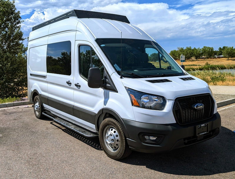 White Ford Transit camper van — photo 1