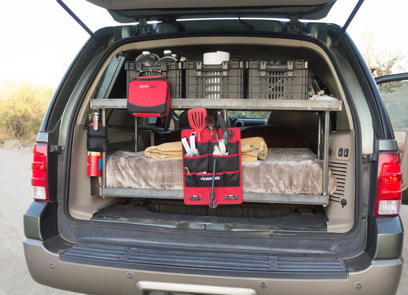  and water supply. Perfect for your next adventure.|Car camping setup: SUV with bed — photo 7