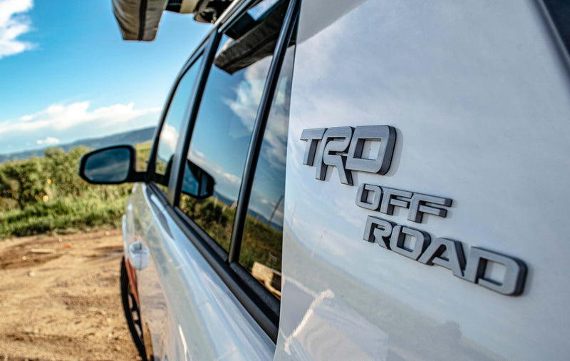  ready for outdoor excursions or your rv rental journey.|Up close: a hard-shell rooftop tent deployed on a clean RV rental vehicle — photo 5