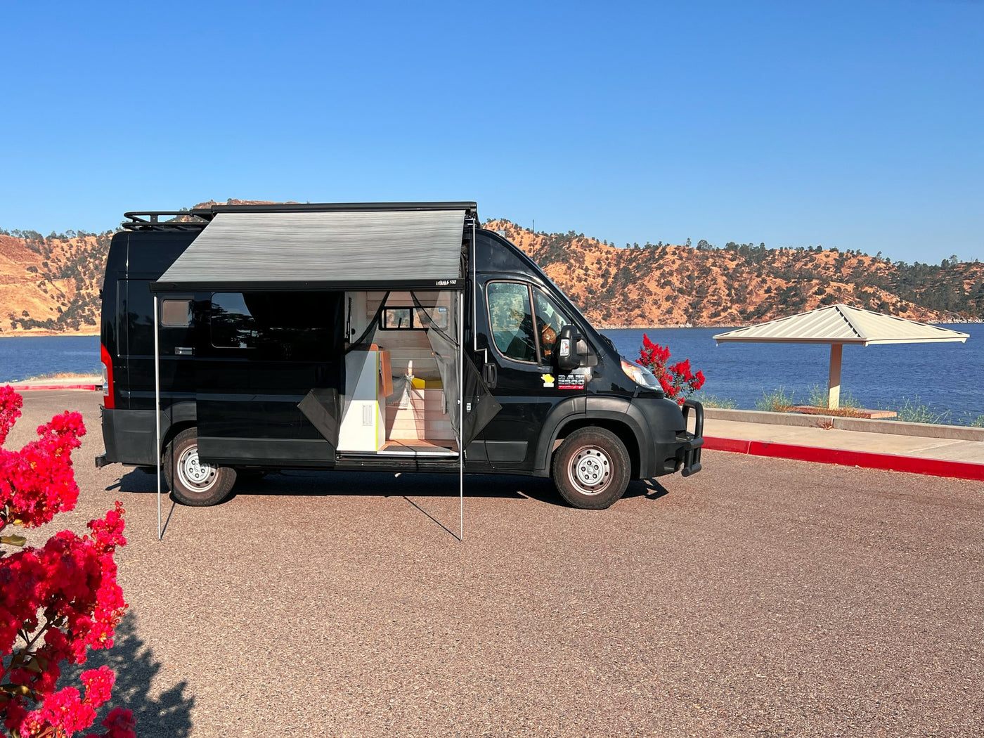  featuring a roof rack for boards & a rear bike rack — photo 2