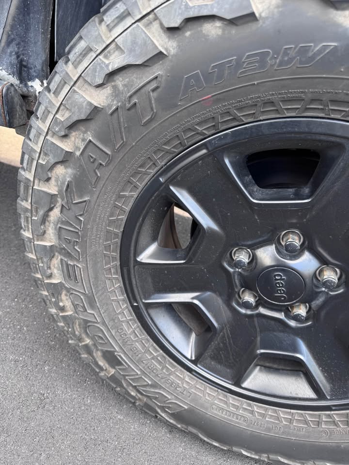 Four Jeep Rims with tires in Tucson, AZ (photo 5)