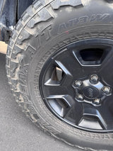 Four Jeep Rims with tires in Tucson, AZ (photo 5)