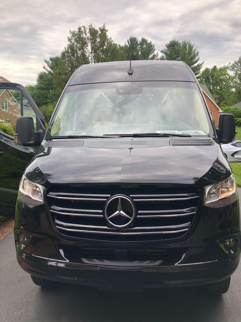 Sleek black Mercedes-Benz Sprinter van, ideal for a luxury RV rental. — photo 3