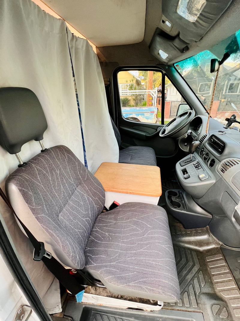 and unique Starry Night divider create a mobile home.|Inside an rv rental: a compact kitchen area with a wooden countertop — photo 18