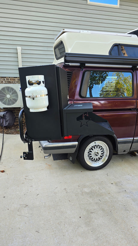 Custom camper van featuring a rear-mounted propane tank and storage, perfect for an rv rental adventure.