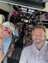 Friends & family travel comfortably in their Arkansas Razorbacks-themed rv rental, ready for game day fun.