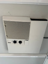 Overhead Duo-Therm Briskair RV AC unit in an RV rental, featuring accessible controls for fan and temperature.
