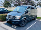 Gray Mercedes Sprinter camper van, ideal for RV rental, parked outdoors.