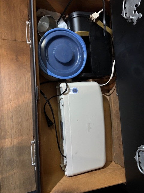 showing empty chilled compartments with an interior light. Ready for your travel drinks!|Black upcycled dresser with ornate handles and a pull-out desk — photo 10
