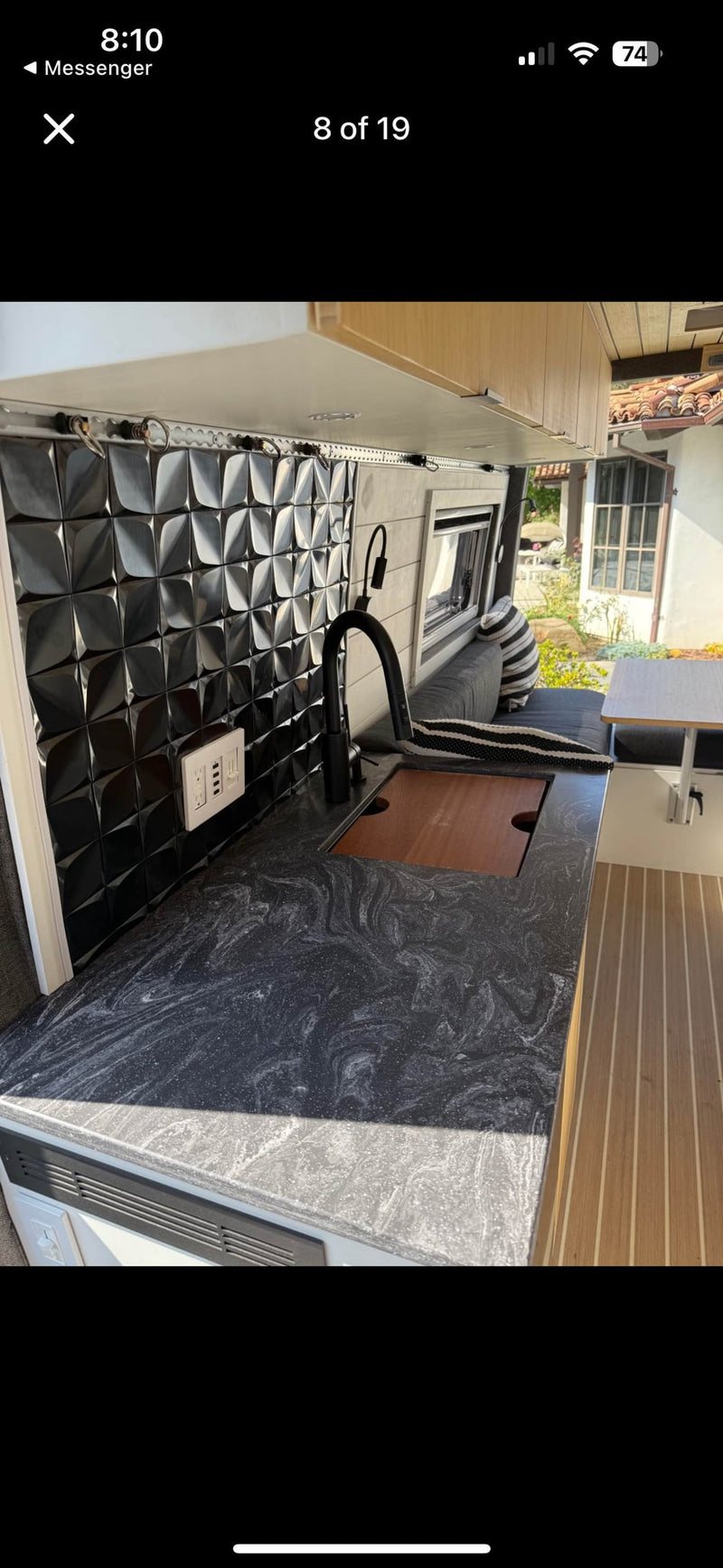  and dining area. Experience comfort on wheels.|Explore this modern rv rental camper van: light wood interior — photo 5