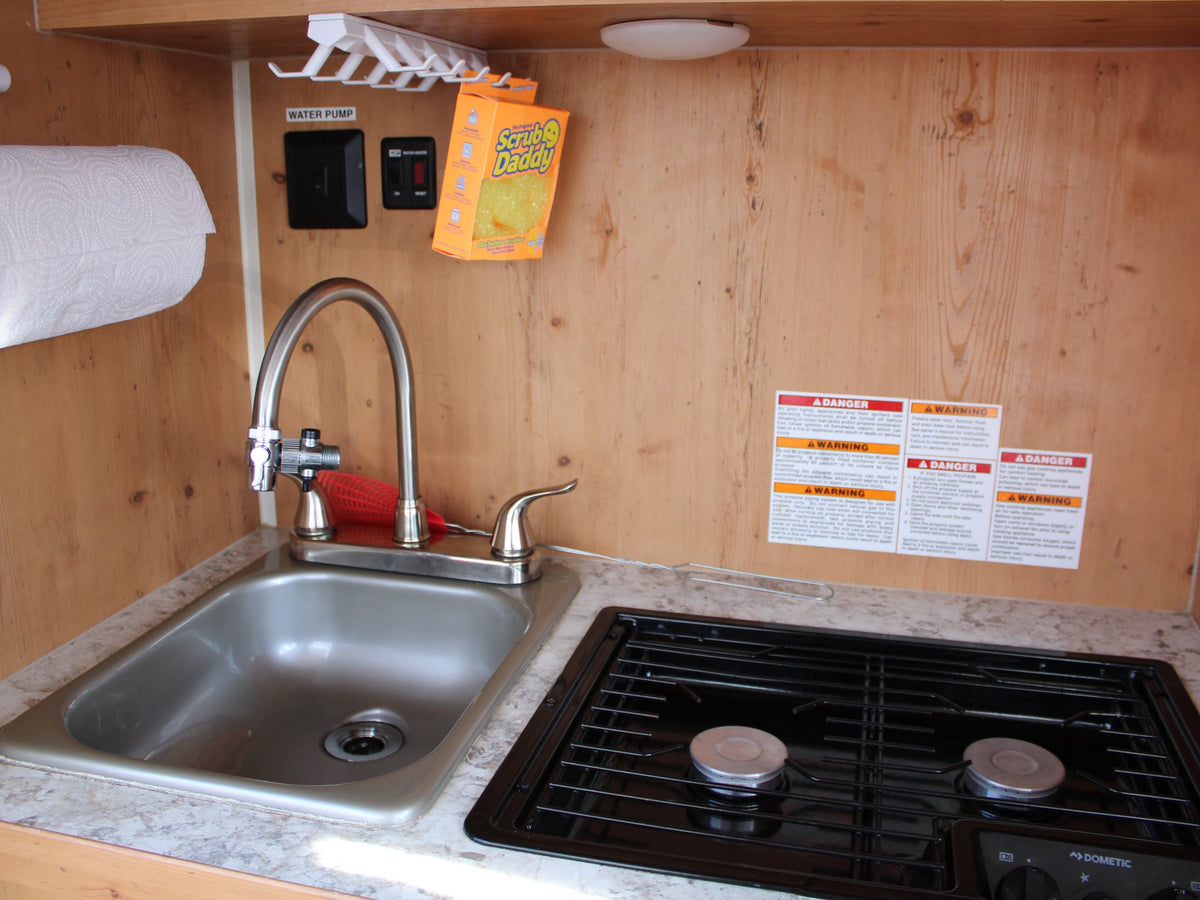  perfect for relaxing on your trip.|RV rental interior showing an AC unit — photo 8