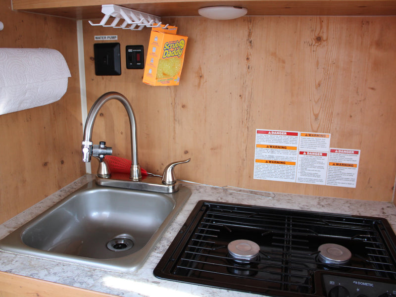  perfect for relaxing on your trip.|RV rental interior showing an AC unit — photo 8