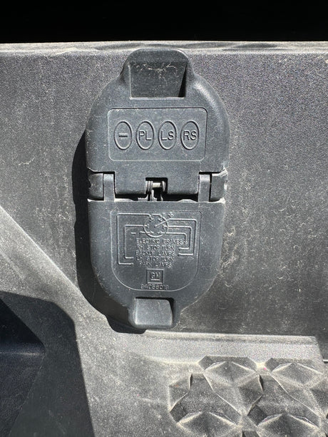 This 7-pin trailer hitch wiring for an rv rental supplies power for electric brakes, lights, and signals, ensuring safe towing.