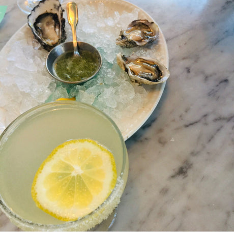 Delicious oysters & a bright lemon cocktail await. Visualize this relaxing scene on your next rv rental trip.