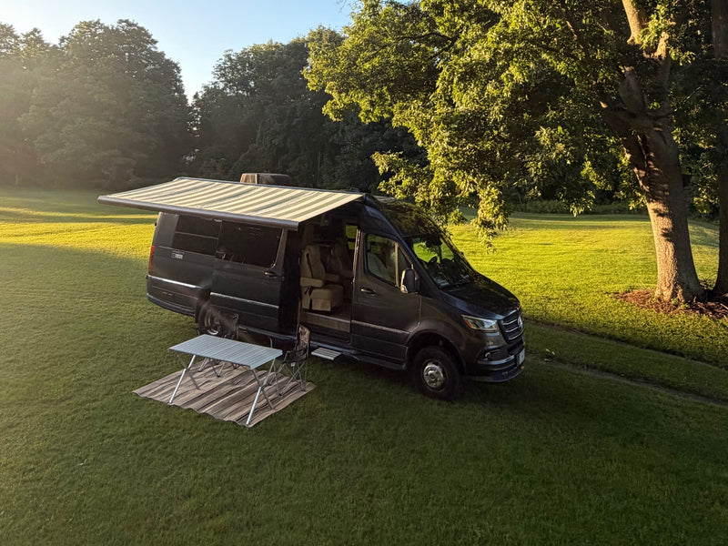  and panoramic beach views. Ideal for your next vacation.|RV rental shower with a chrome handheld showerhead — photo 8