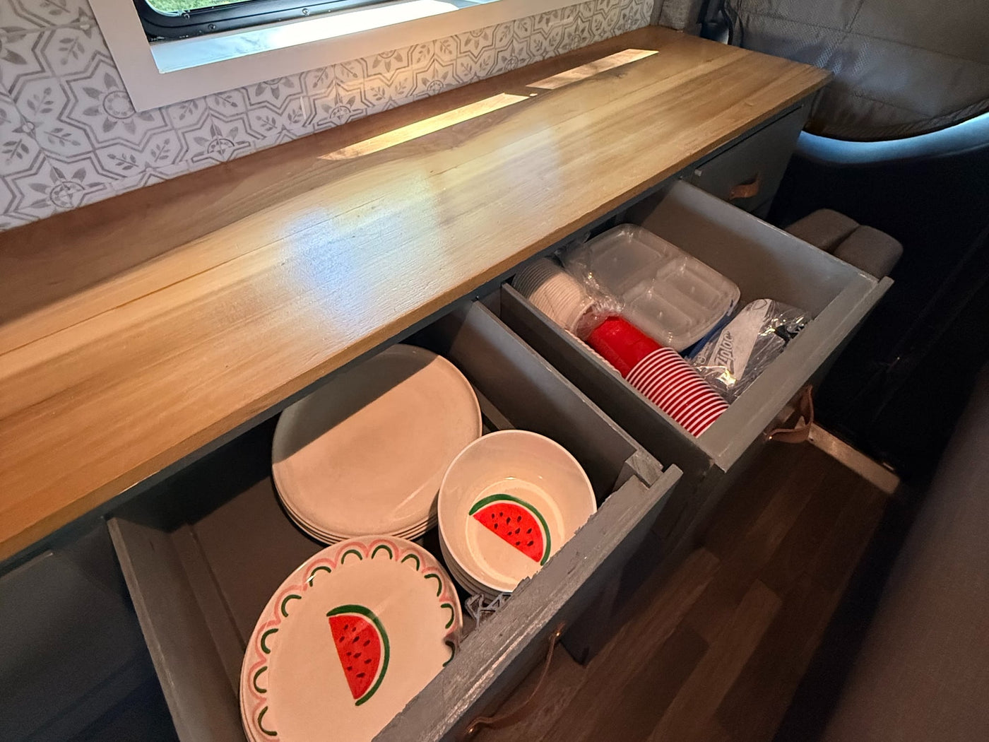  at a sunny outdoor park. Ready for adventure!|Fully equipped rv rental interior featuring a kitchenette — photo 5