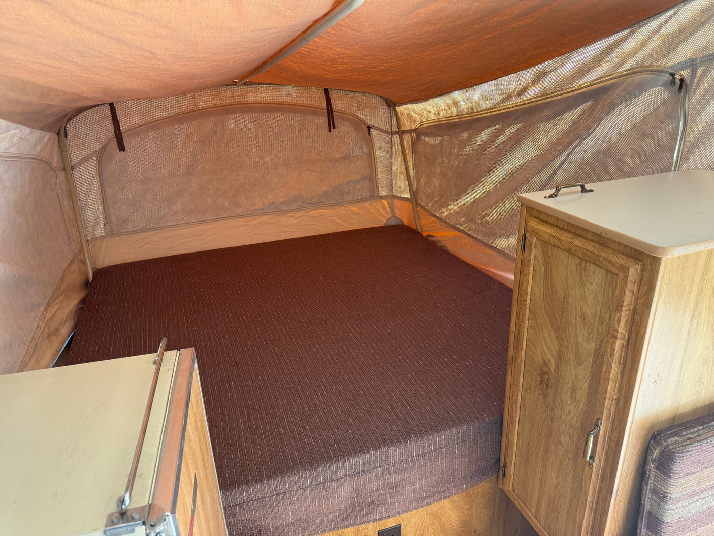  and seating. Camping adventure ready!|Cozy pop-up RV rental interior with dinette