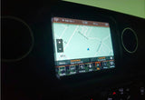 This car infotainment system shows a GPS map in Schaumburg, ideal for an RV rental. Displays time, temperature, and FM 101.1 radio.