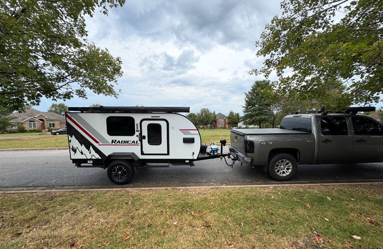  and built-in storage/controls.|Modern rv rental interior: convertible padded benches — photo 9