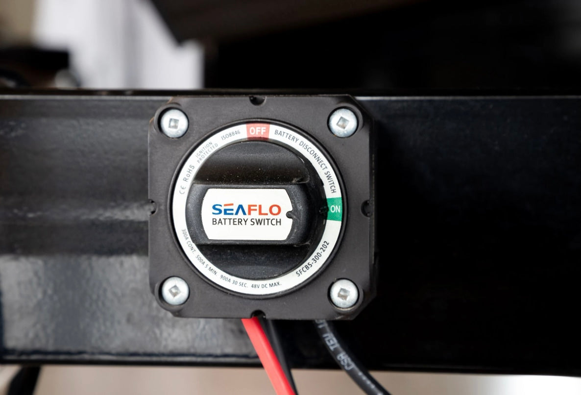 RV rental battery disconnect switch by Seaflo, set to ON. Essential for power control and safety.